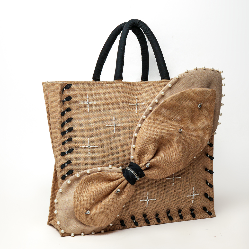 THE INFINITY BOW BAG