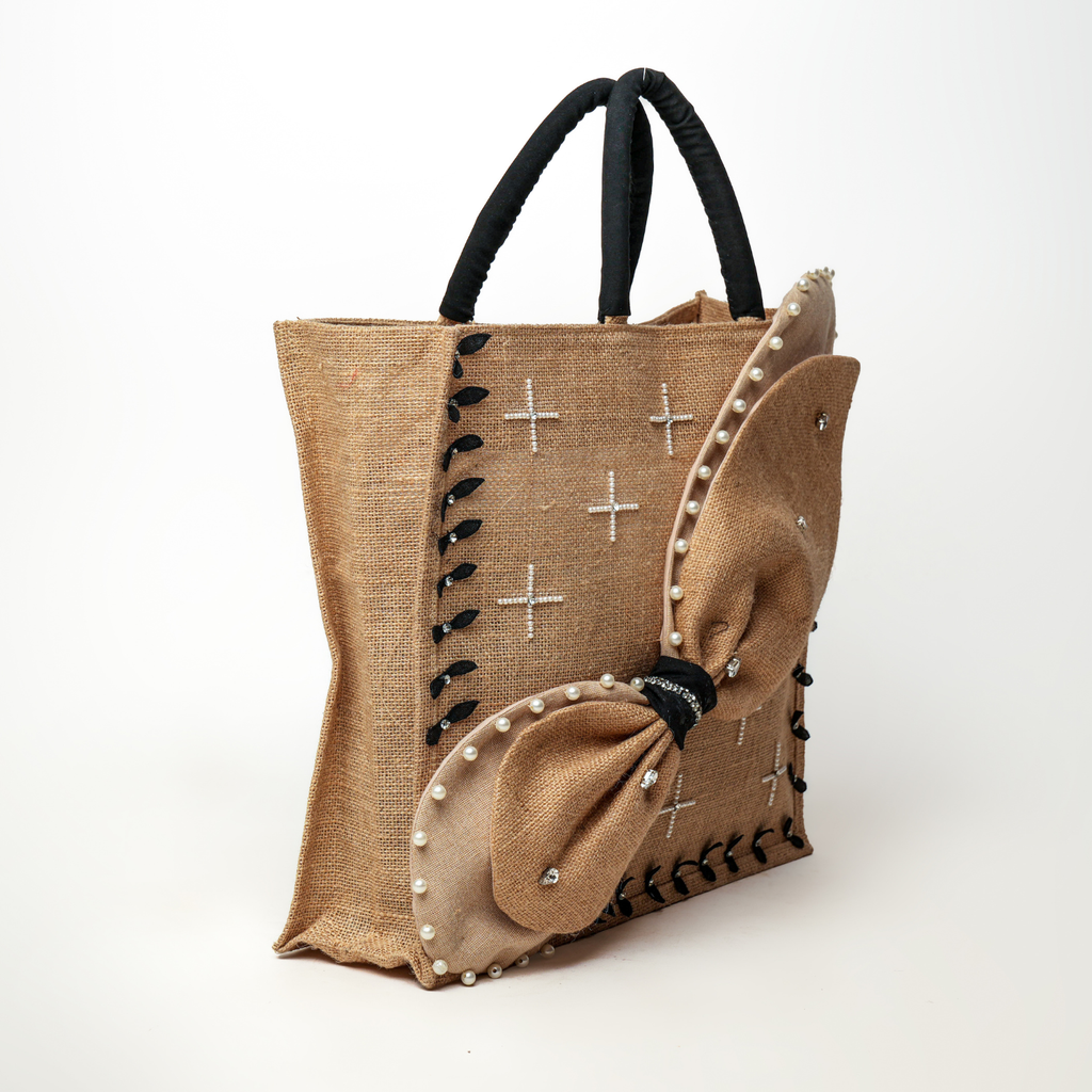 THE INFINITY BOW BAG